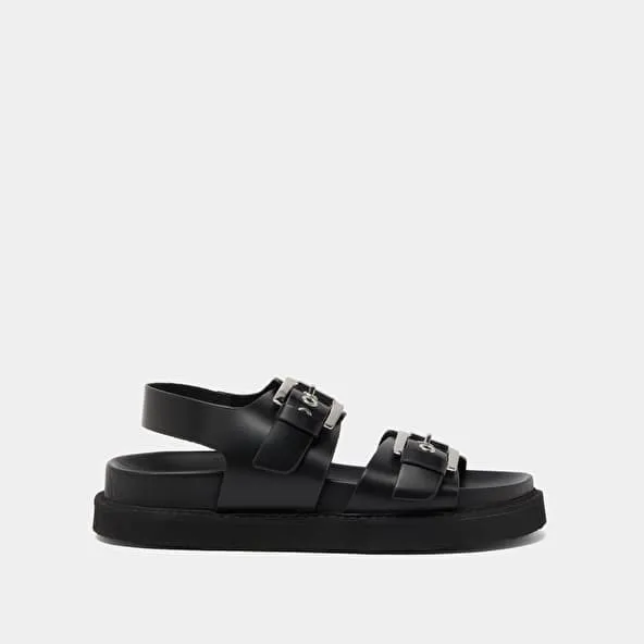 Double buckle sandals in glazed black leather